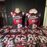 Completed red, black and white custom basketball jerseys shown by Dale Finds